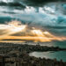 Dramatic sky and sunset over Beirut City and it's Mediterranean sea. Shot taken from a vintage point above Jounieh bay seen in the foreground.