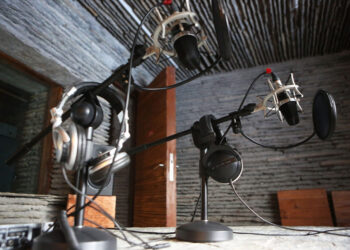 JOMSOM, NEPAL - MAY 28:  Microphones and other equipment in the recording room of the MBC radio station on May 28, 2014 in Jomsom, Nepal. The Mustang Broadcasting Community building which is financed by the Korea International Cooperation Agency and designed by Archium utilising locally available materials and labour is the first radio station of its kind in Mustang. Mustang is one of Nepal's most remote regions and the station sits 3000 metres above sea level, situated on a ledge close to the banks of the Kali Gandaki River. (Photo by Taylor Weidman/Getty Images)